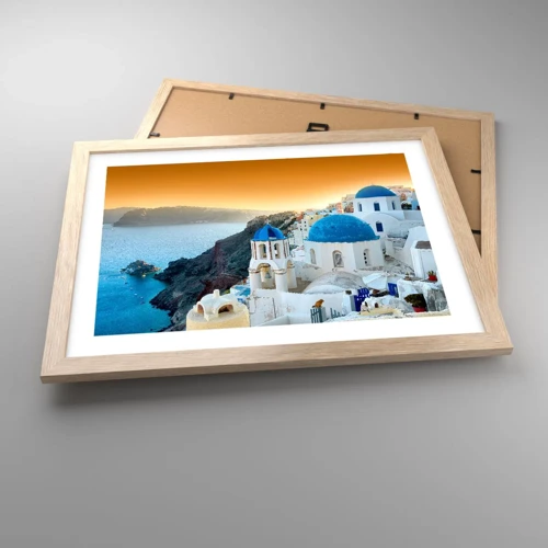 Een poster in een licht eiken lijst - Santorini - genesteld tegen de rotsen - 40x30 cm