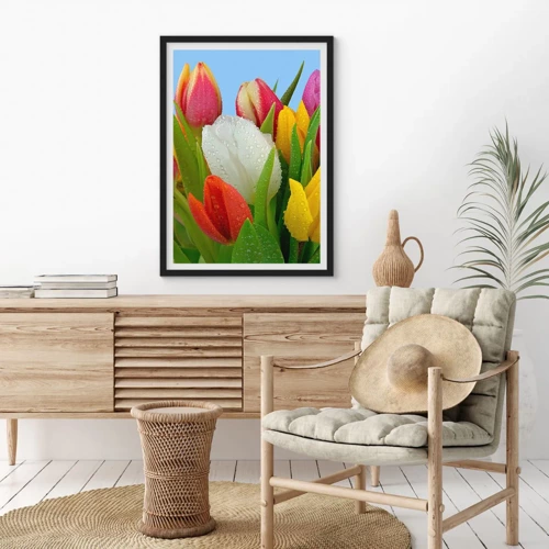 Poster in een zwarte lijst - Een bloemenregenboog in dauwdruppels - 50x70 cm