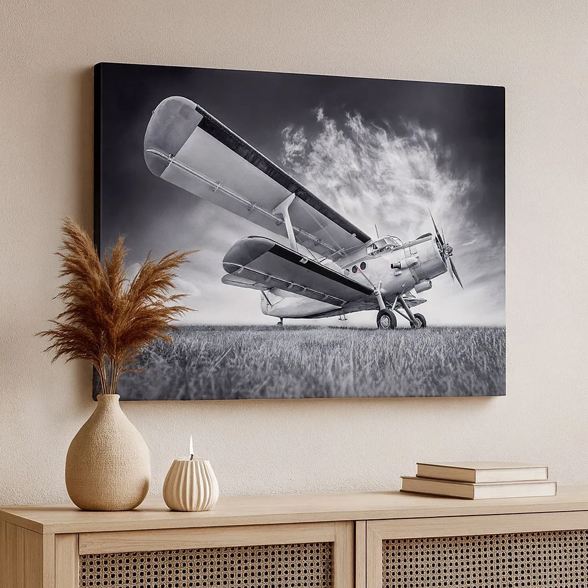 Schilderen op canvas - Een vliegtuig tegen een dramatische lucht in zwart-wit - 70x50cm - De gevleugelde zwerver - Moderne wanddecoratie voor woonkamer en slaapkamer ARTTOR