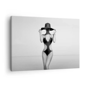 Schilderen op canvas - Zwart-wit silhouet van een vrouw met een hoed tegen de achtergrond van de zee - 70x50cm - Mijn naam is: Elegantie - Moderne wanddecoratie voor woonkamer en slaapkamer ARTTOR