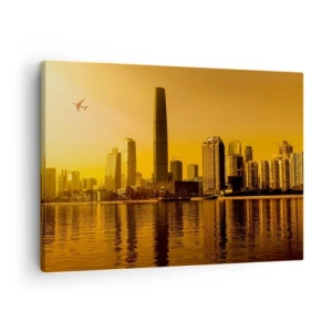 Schilderen op canvas - Stadspanorama bij zonsondergang met wolkenkrabbers en een vliegtuig - 70x50cm - De gouden stad - Moderne wanddecoratie voor woonkamer en slaapkamer ARTTOR