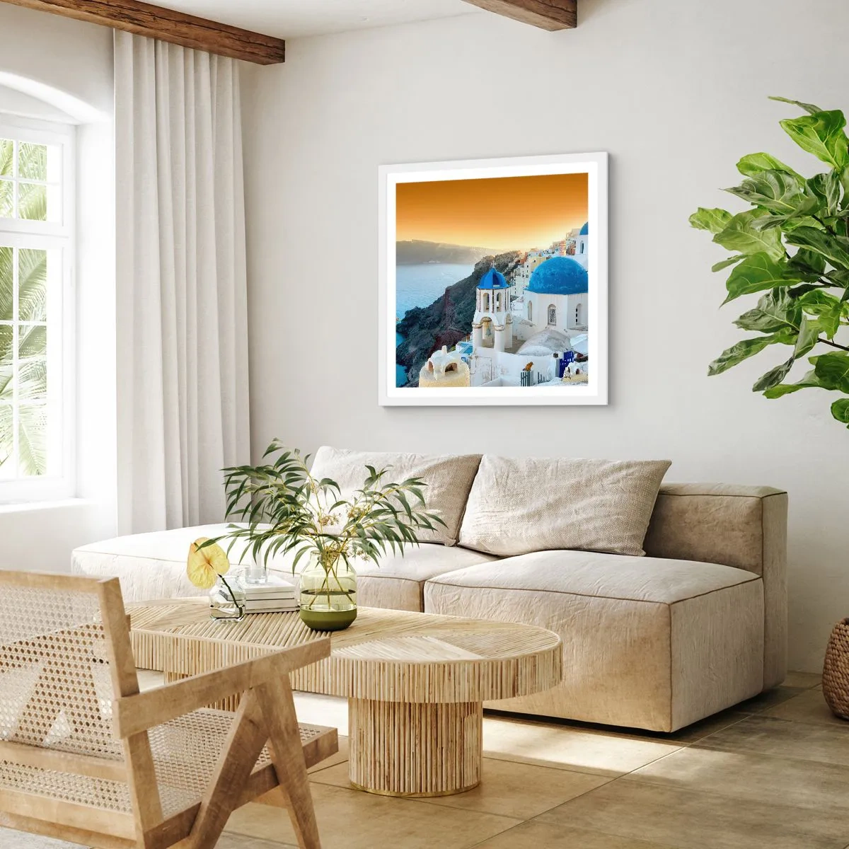 Poster in een witte lijst - Santorini - genesteld tegen de rotsen - 50x50 cm