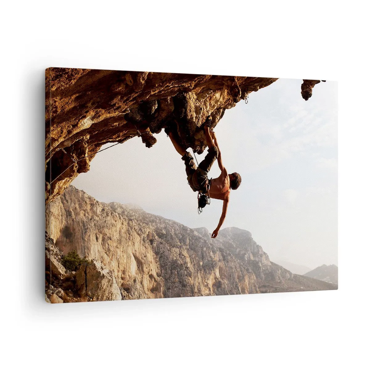 Schilderen op canvas - Een klimmer op een steile klif in de bergen in de zon - 70x50cm - De wereld gekrompen in een hand op een rotsblok - Moderne wanddecoratie voor woonkamer en slaapkamer ARTTOR