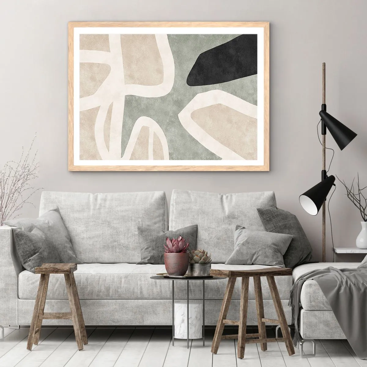 Een poster in een licht eiken lijst - Compositie met een zwart motief - 100x70 cm