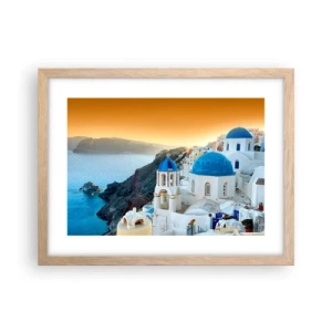 Een poster in een licht eiken lijst - Santorini - genesteld tegen de rotsen - 40x30 cm