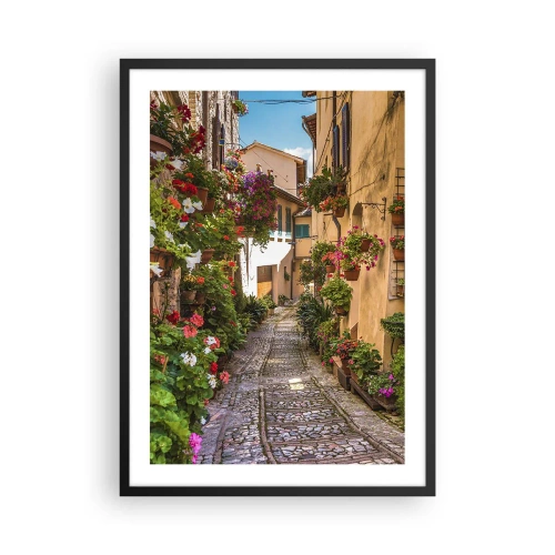 Poster in een zwarte lijst - Een charmante straat met bloemen en een geplaveid pad op een zonnige dag - 50x70cm - Italiaans zijstraatje - Moderne wanddecoratie voor woonkamer en slaapkamer ARTTOR