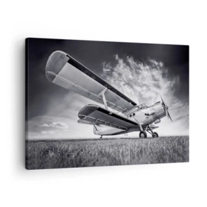 Schilderen op canvas - Een vliegtuig tegen een dramatische lucht in zwart-wit - 70x50cm - De gevleugelde zwerver - Moderne wanddecoratie voor woonkamer en slaapkamer ARTTOR