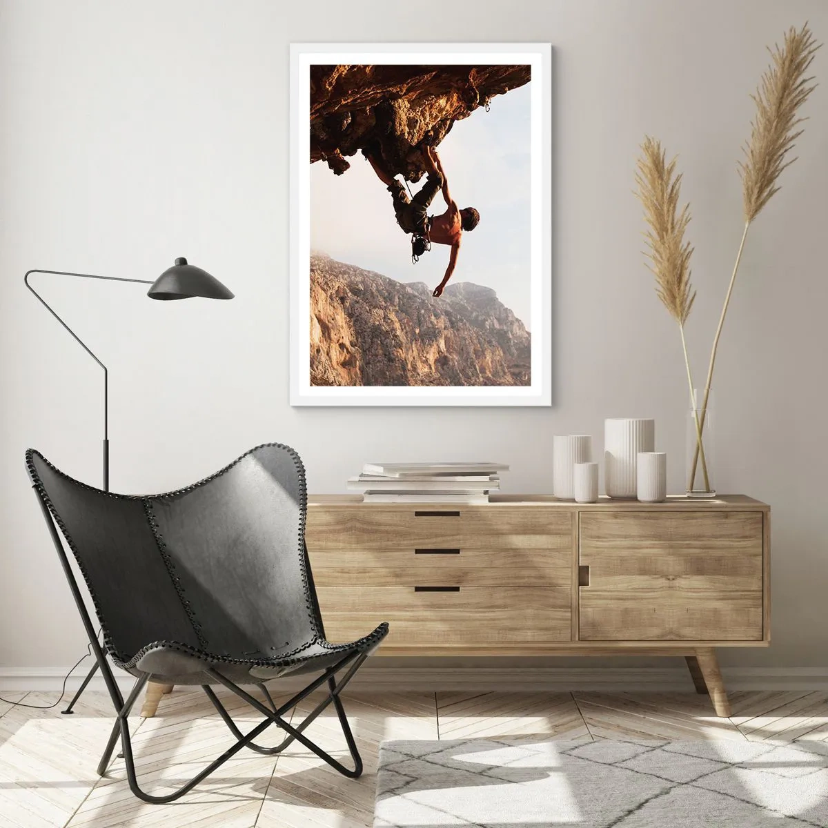Poster in een witte lijst - De wereld gekrompen in een hand op een rotsblok  - 30x40 cm