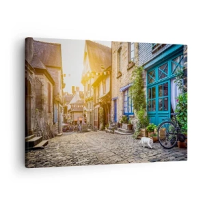 Schilderen op canvas - Een charmante straat met stenen bestrating in het zonlicht - 70x50cm - De witte geest van het stadje - Moderne wanddecoratie voor woonkamer en slaapkamer ARTTOR