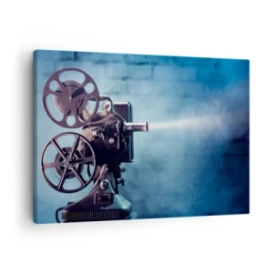 Schilderen op canvas - Een oude filmprojector die licht werpt op een blauwe achtergrond - 70x50cm - In de oude bioscoop - Moderne wanddecoratie voor woonkamer en slaapkamer ARTTOR