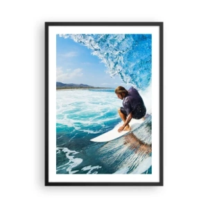 Poster in een zwarte lijst - Een surfer in een waterband tegen de achtergrond van een blauwe oceaan - 50x70cm - Dansend met de golven - Moderne wanddecoratie voor woonkamer en slaapkamer ARTTOR
