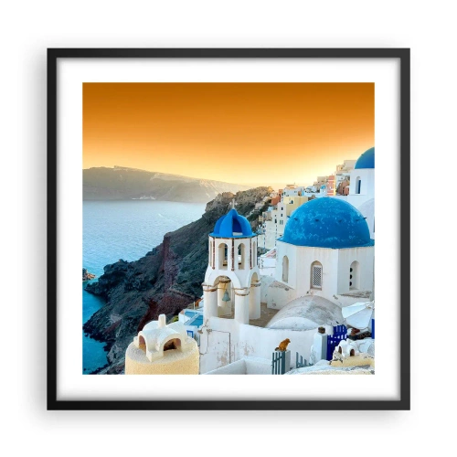 Poster in een zwarte lijst - Santorini - genesteld tegen de rotsen - 50x50 cm