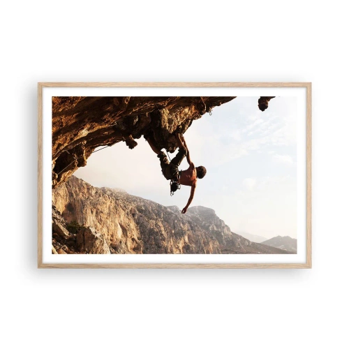 Een poster in een licht eiken lijst - De wereld gekrompen in een hand op een rotsblok - 91x61 cm