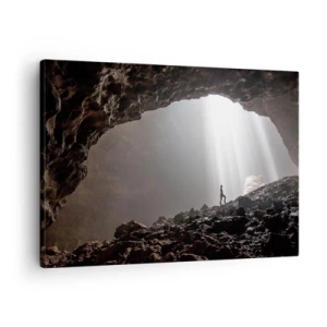 Schilderen op canvas - Een figuur in een grot verlicht door lichtstralen - 70x50cm - De lichtgevende grot - Moderne wanddecoratie voor woonkamer en slaapkamer ARTTOR