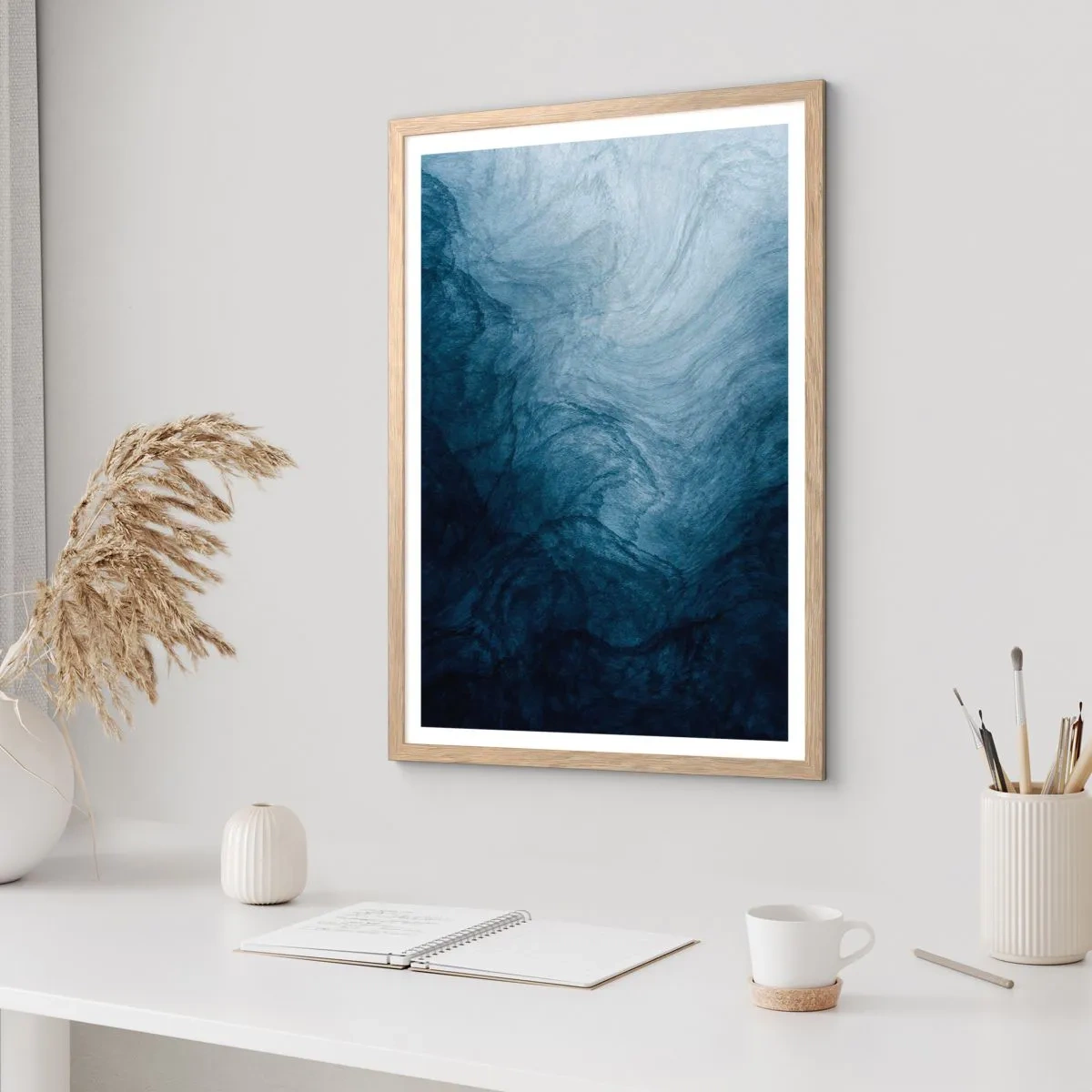 Een poster in een licht eiken lijst - diep reiken - 70x100 cm