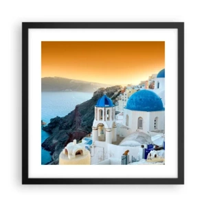 Poster in een zwarte lijst - Santorini - genesteld tegen de rotsen - 40x40 cm