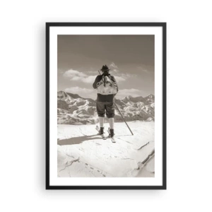 Poster in een zwarte lijst - Een skiër in retrostijl met bergen op de achtergrond - 50x70cm - En de bergen blijven onveranderd - Moderne wanddecoratie voor woonkamer en slaapkamer ARTTOR