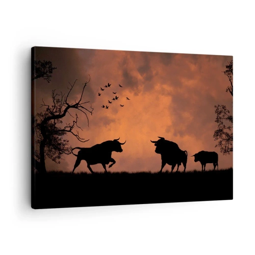 Schilderen op canvas - Silhouetten van stieren tegen een oranje lucht bij zonsondergang - 70x50cm - Een dramatisch schouwspel van de natuur - Moderne wanddecoratie voor woonkamer en slaapkamer ARTTOR