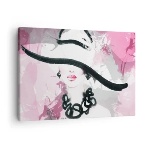 Schilderen op canvas - Een elegante vrouw met een hoed tegen een achtergrond van roze abstracties. - 70x50cm - Portret van een dame in zwart en roze - Moderne wanddecoratie voor woonkamer en slaapkamer ARTTOR