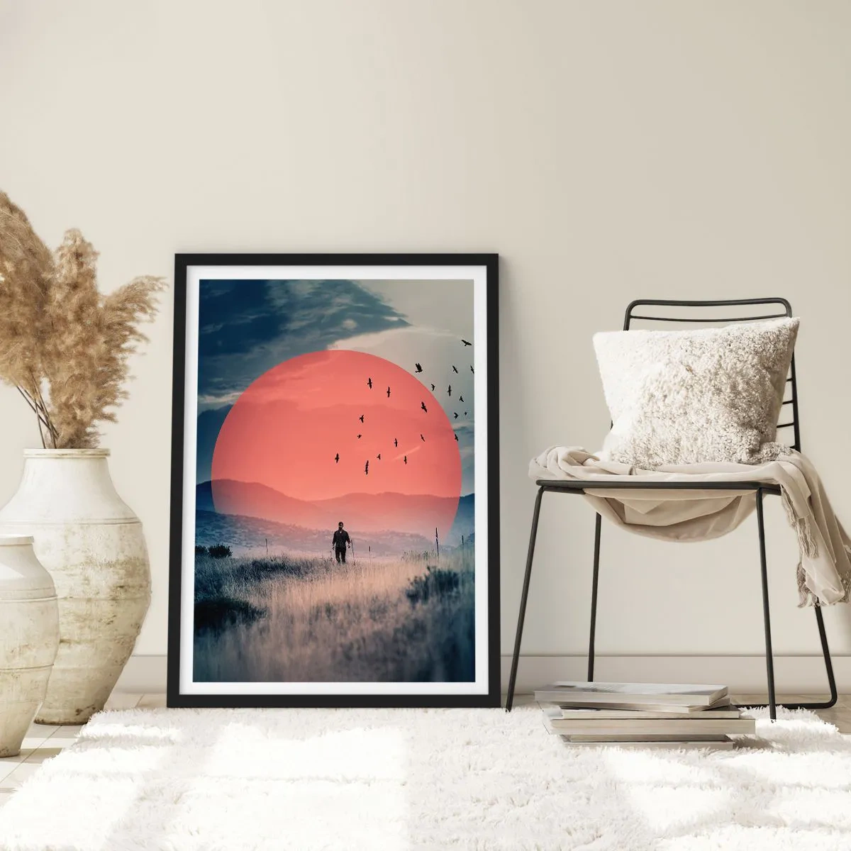 Poster in een zwarte lijst - Een man die door een veld loopt tegen een rode zon - 50x70cm - In hun elementen - Moderne wanddecoratie voor woonkamer en slaapkamer ARTTOR